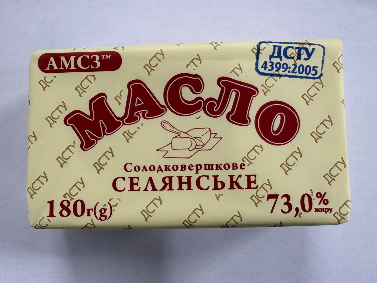 Масло солодковершкове селянське 73% жир.,180 грам.ТМ "АМСЗ"